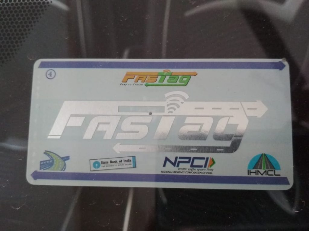 FASTag sticker on vehicle windscreen